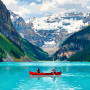 Red Canoe on a Turquoise Glacier Lake
