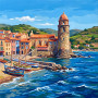 Kleurrijk kustdorp Collioure met vissersboten en kerktoren