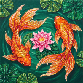 Poissons rouges et lotus rose