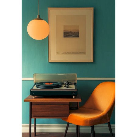 Tourne-disque vintage et fauteuil orange rétro