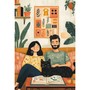 Couple lisant un livre avec son chat noir sur le canapé