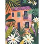 Maison rose et feuillage tropical