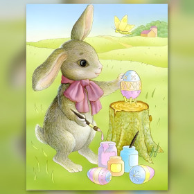 Osterhase malt verziertes Ei mit glänzenden Diamond Painting Strasssteinen