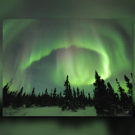 Green northern lights over snowy forest diamond painting with shiny rhinestones