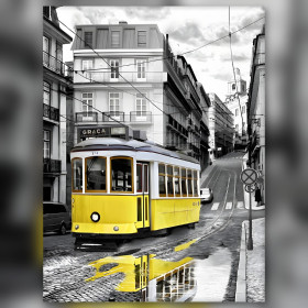 Yellow tram on wet cobblestones with reflections in shiny diamond painting rhinestones
