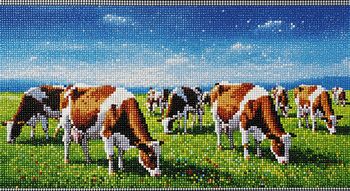 Tableau de diamond painting représentant un troupeau de vaches dans un pré.
