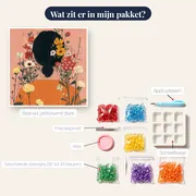 Vrouw van achteren met oranje trui en bloemen in het haar Diamond Painting – inhoud van het pakket