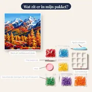 Gouden lariksen op besneeuwde bergtoppen onder blauwe lucht – inhoud van het pakket
