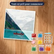 Canoë rouge sur lac glaciaire turquoise – kit prêt à commencer