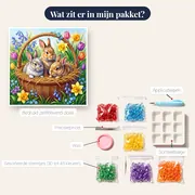 Jonge konijntjes in rieten mand met lentebloemen – inhoud van het pakket