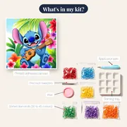 Grinning Stitch Seated Among Plumeria Blooms – kit contents