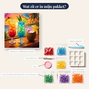Tropische cocktails met parasol bij zonsondergang – inhoud van het pakket