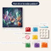 Pasgeboren draakje tussen stralende kristallen – inhoud van het pakket