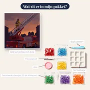 Brandweerman op hoge ladder bij schemer – inhoud van het pakket