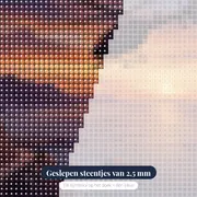 Helikopter boven kustlijn bij zonsondergang – close-up van de steentjes