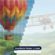 Ballon und Oldtimer-Flugzeug über dem Tal – Nahaufnahme der Steine