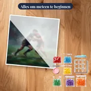Twee spelers in een tackle met waternevel – pakket klaar om te beginnen