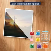 Kruis op heuvel bij zonsopgang – pakket klaar om te beginnen