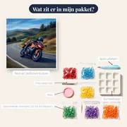 Sportmotor in scherpe bergbocht – inhoud van het pakket