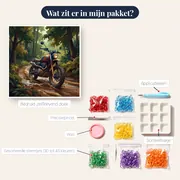 Scrambler die modder spat op een bospad – inhoud van het pakket