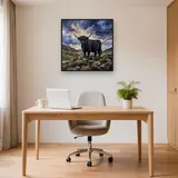Black Highland Cow on Rocky Hillside – Office
