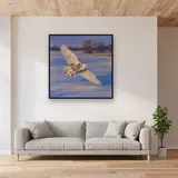 Snowy Owl Over Winter Field – displayed in a living room