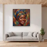 Joyful Headwrap Portrait in Wax Print – displayed in a living room